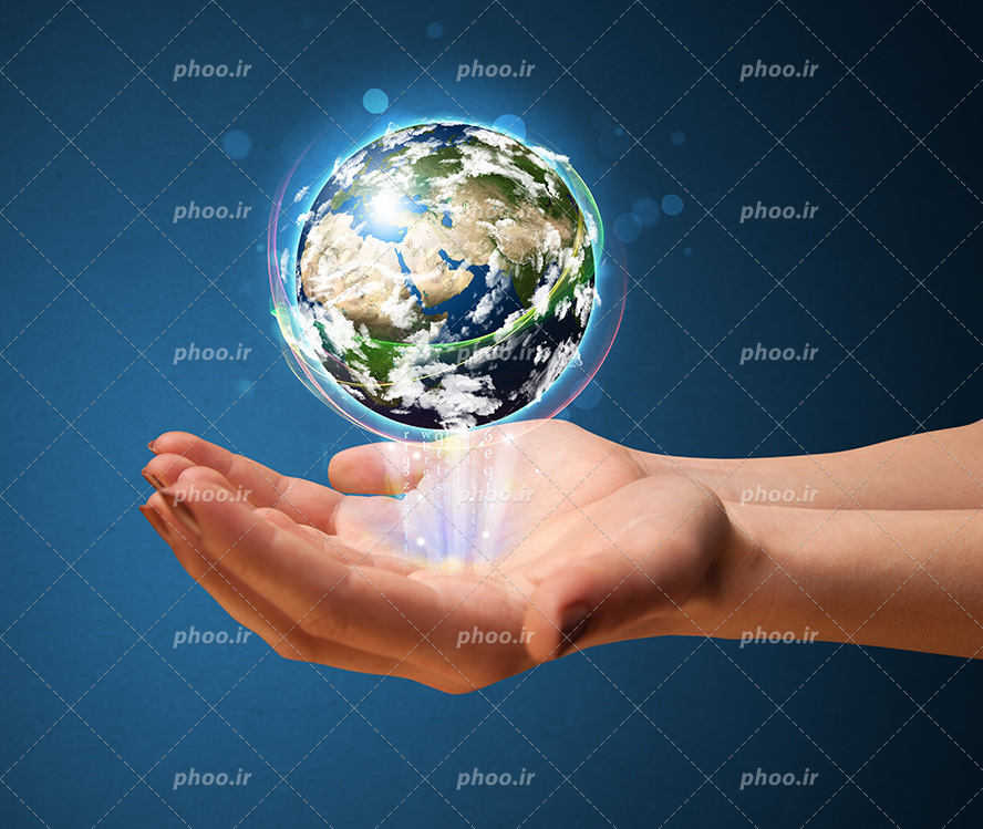 عکس با کیفیت کره زمین معلق در هوا و مدار های رنگی به دورش و دست انسان در زیر کره زمین