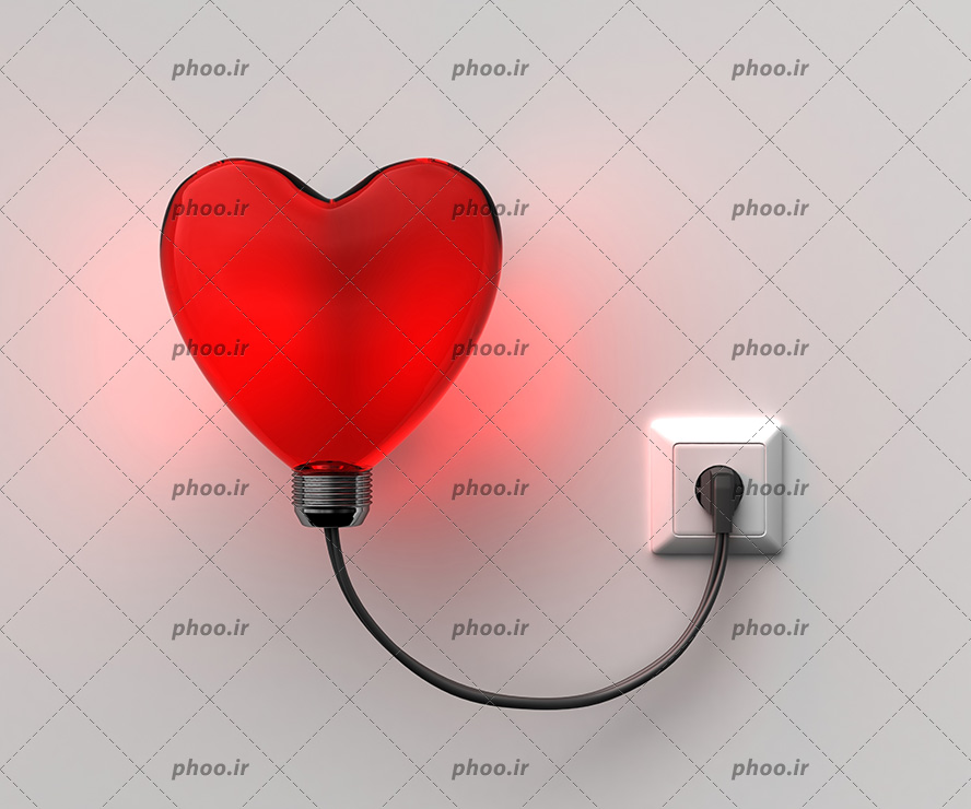عکس با کیفیت چراغ خواب به شکل قلب قرمز و روشن شده به کمک پریز برق