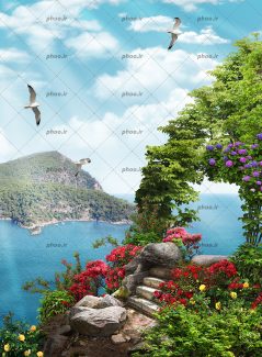 عکس با کیفیت طبیعت بسیار زیبا و سرسبز با گل های رنگارنگ و دریا با کوه های سرسبز