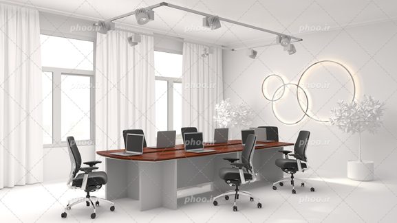 عکس با کیفیت اتاق جلسات و میز کنفرانس و لپ تاپ ها بر روی میز و نور پردازی از سقف در بالای میز