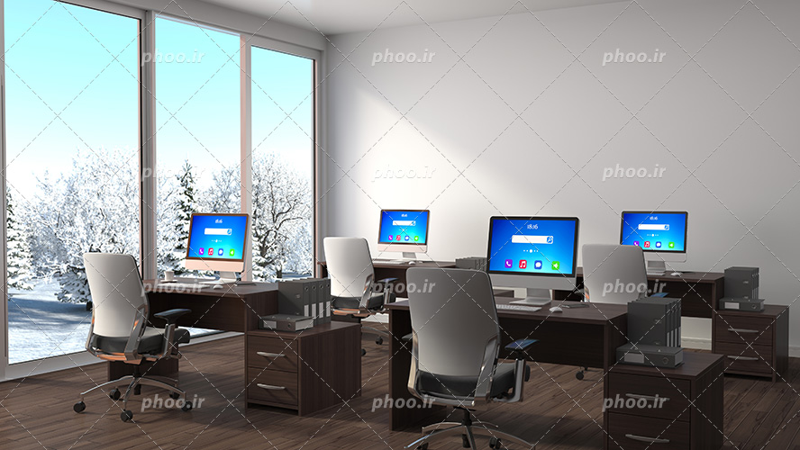 عکس با کیفیت پنجره و نمایی از درختان برفی در کنار میز های اداری و سیستم های روشن بر روی آنها