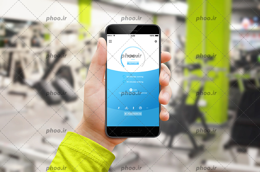 عکس موبایل و نرم افزار محاسبه ی چربی سوزی و میزان کالری سوزی حین ورزش در باشگاه بدنسازی