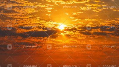 غروبِ زرین در آغوشِ ابرها