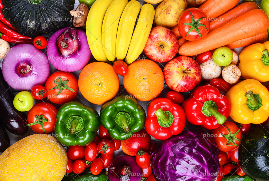 عکس با کیفیت انواع میوه و سبزیجات تازه چیده شده در کنار یکدیگر