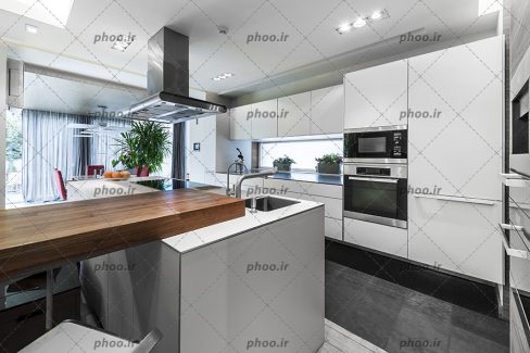 عکس آشپزخانه مدرن با کابینت های سفید