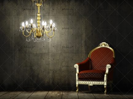 عکس یک مبل تک نفره ی قهوه ای گوشتی با چهارپایه سفید طلایی و تاج طلایی و یک لوستر با رنگ طلایی و لامپ های سفید روشن با پس زمینه مشکی