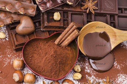 عکس پودر و شکلات ها با شکل های مختلف کاکائویی و فندق