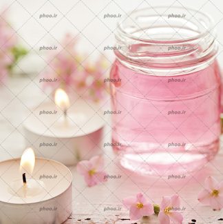 عکس شمع و گل و اسانس برای ماساژ