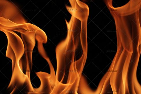 عکس زیبا آتش شعله ور با پس زمینه مشکی
