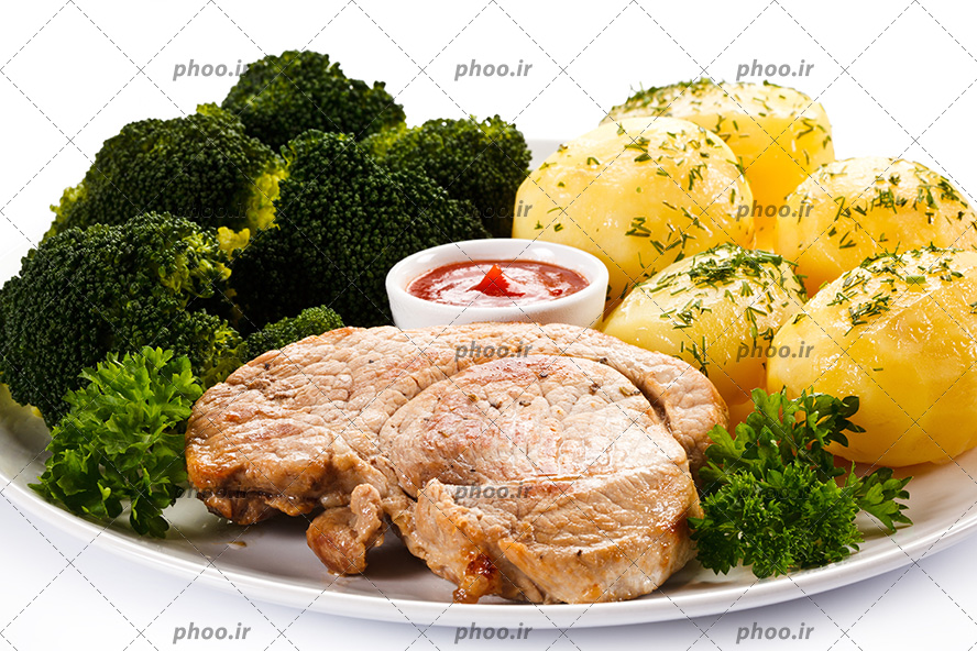 عکس گوشت کبابی در کنار سیب زمینی آب پز و کلم بروکلی