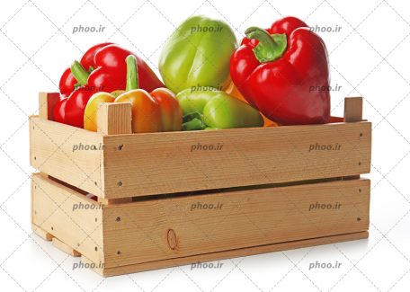 عکس با کیفیت دلمه های رنگی در جعبه چوبی