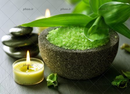 عکس زیبا وسایل ماساژ با شمع و سنگ