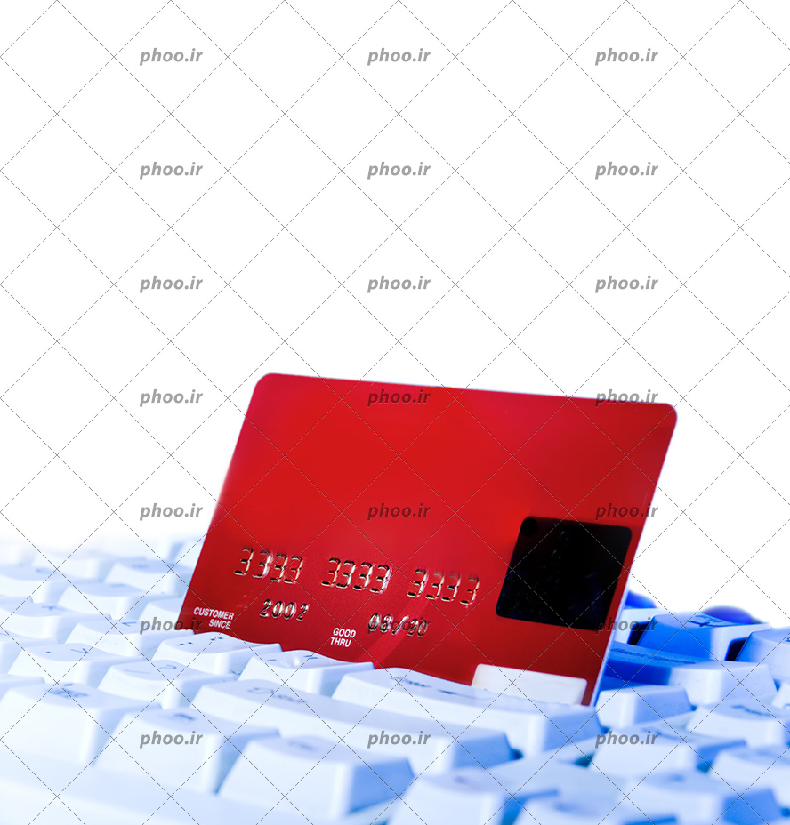 عکس با کیفیت کارت اعتباری قرمز روی کیبورد کامپیوتر