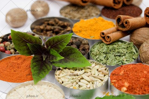 عکس ادویه های مختلف در ظرف های نقره ای