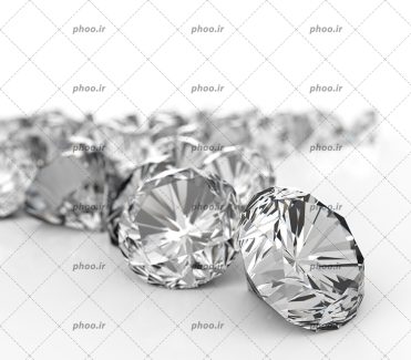 عکس با کیفیت تعداد زیادی الماس در پس زمینه سفید