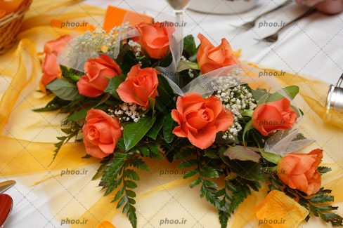 عکس یک دسته گل از گل های رز نارنجی
